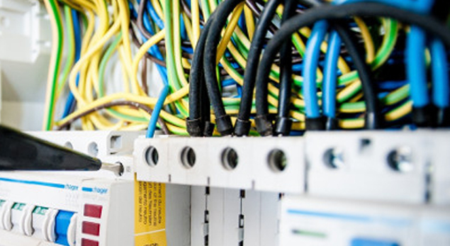 Close-up of new wiring being installed in a Cheltenham property.